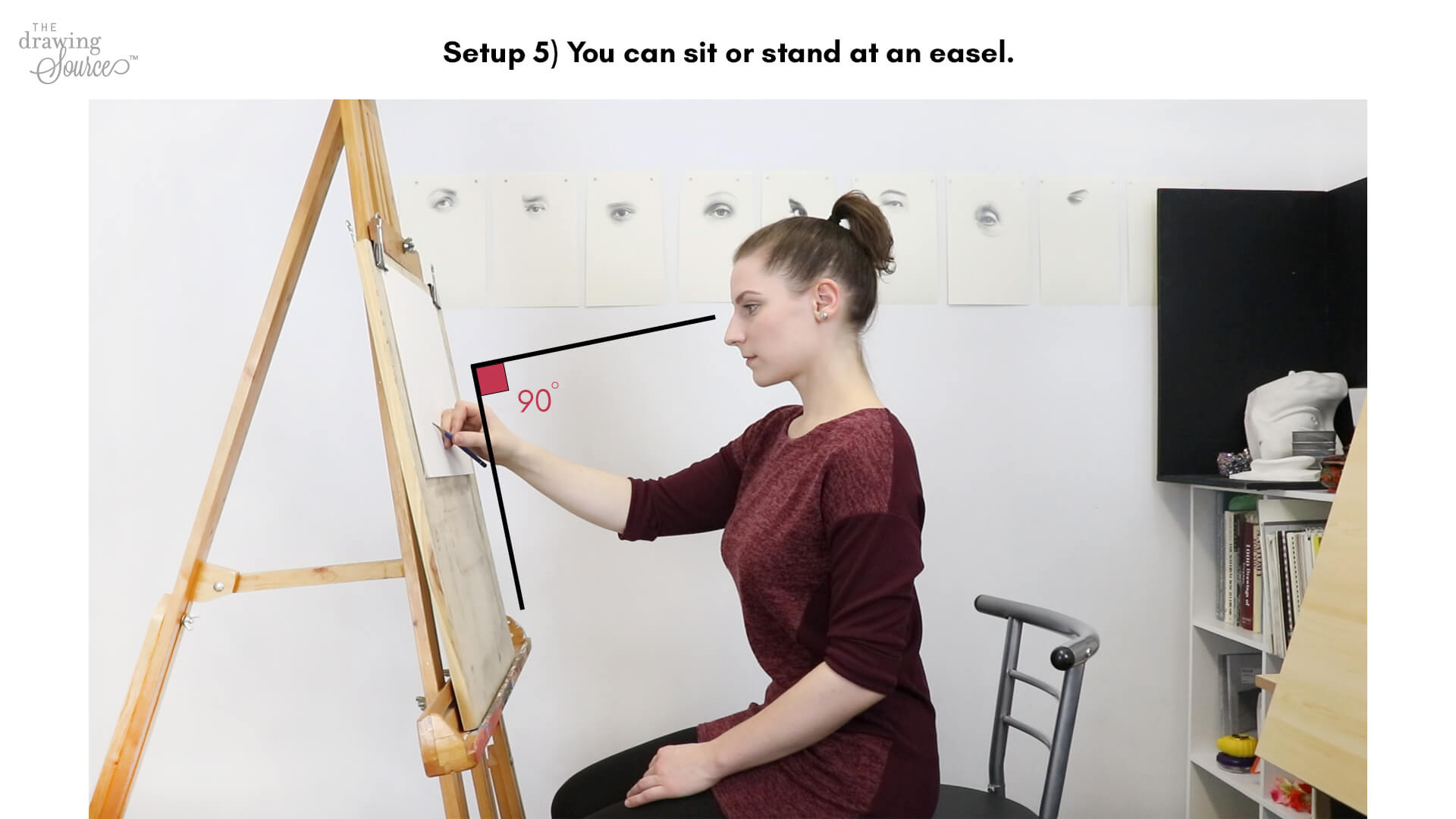 Drawing at an easel Drawing at an easel