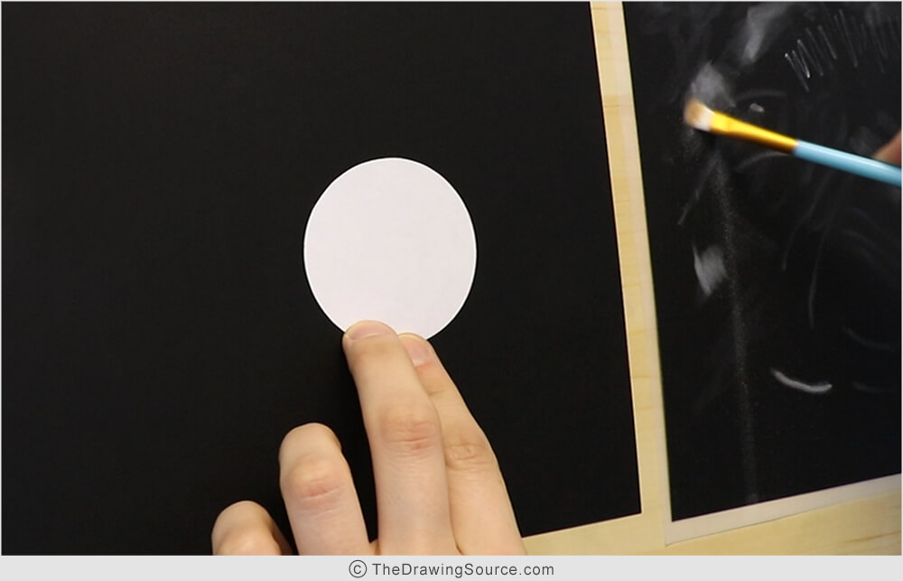 Picking up pencil dust with my brush